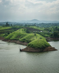 Scenic view of river against sky