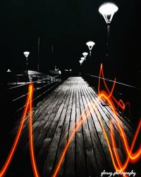 Close-up of illuminated lights at night