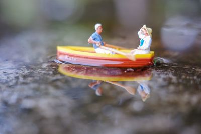 Close-up of stuffed toy floating on water