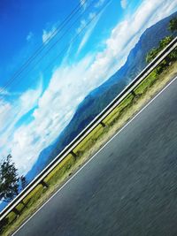 Scenic view of landscape against blue sky