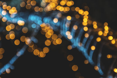 Defocused image of illuminated lights at night