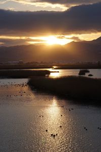 Scenic view of sea against sky during sunset