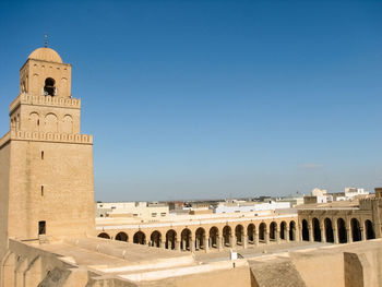 View of historical building against clear blue sky