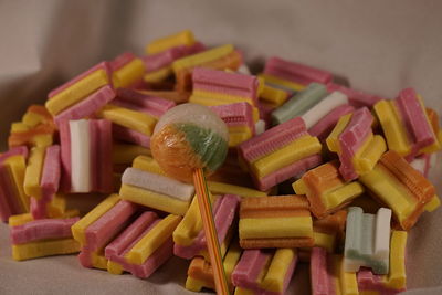 Close-up of multi colored bubble gum and lollipops. sweets
