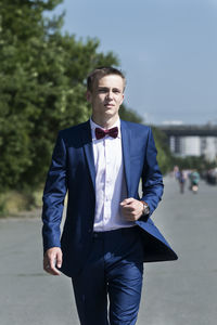 Charismatic stylish young man on a walk