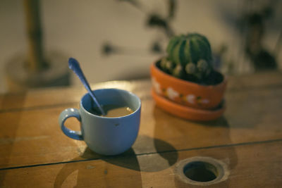 Close-up of coffee cup on table