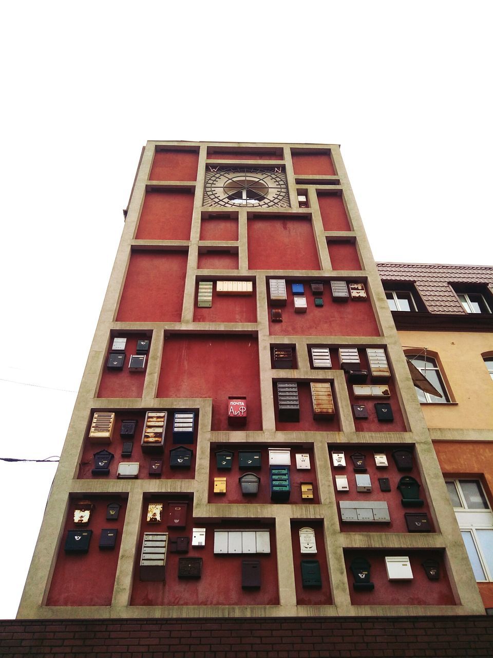 LOW ANGLE VIEW OF BUILDING WITH CLEAR SKY