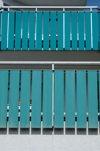 Balcony rail in turquoise
