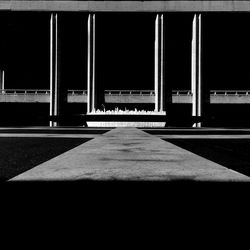 Empty road in city at night