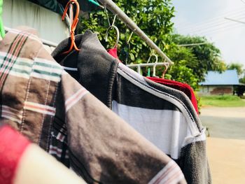 Close-up of clothes hanging on clothesline