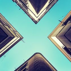 Low angle view of building against blue sky