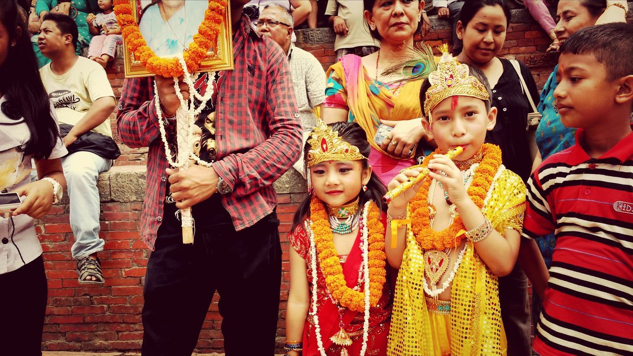 togetherness, childhood, lifestyles, bonding, happiness, person, love, leisure activity, boys, smiling, casual clothing, elementary age, portrait, fun, girls, family, sibling, looking at camera