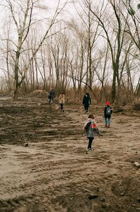 Group of people walking in moody weather