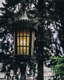 Low angle view of illuminated lamp post