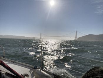 Bridge over sea against sky