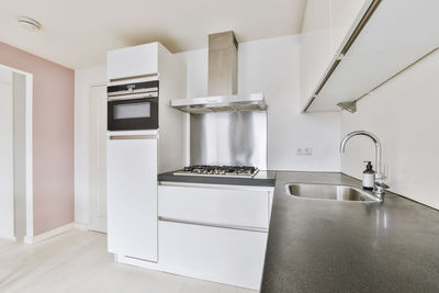 Close-up of gas stove in kitchen