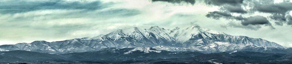 Panoramic view of mountains against sky