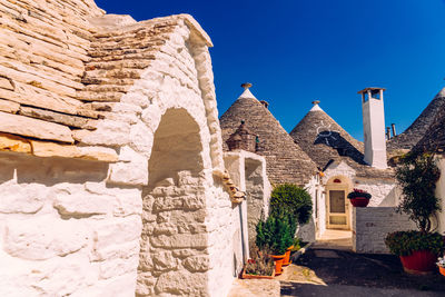 View of old building against blue sky