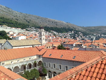 High angle view of townscape against clear blue sky