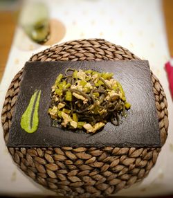 High angle view of bread in basket on table