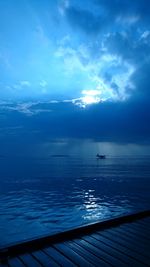 Scenic view of sea against blue sky