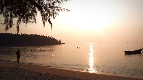 Scenic view of sea at sunset
