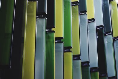 Close-up of yellow and green shutters