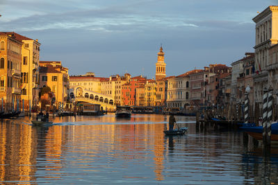 Canal passing through city buildings