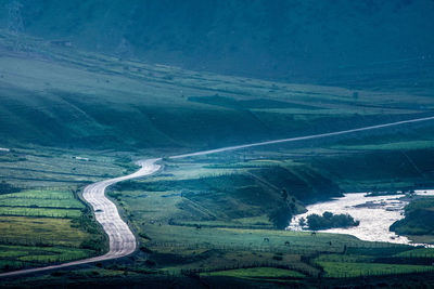 High angle view of road amidst land