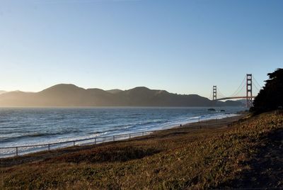 Scenic view of calm sea against clear sky