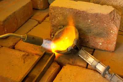 Melting metal in a jewelry workshop