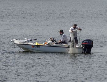 People on boat at sea