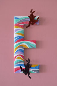 Close-up of colorful letter e on wall