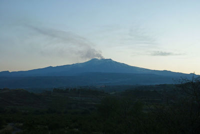 Scenic view of landscape against sky during sunset