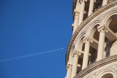 Low angle view of tower against clear blue sky