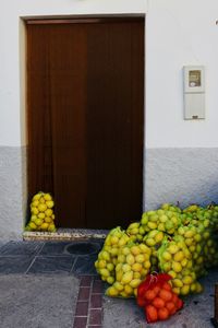 Yellow fruits growing on wall