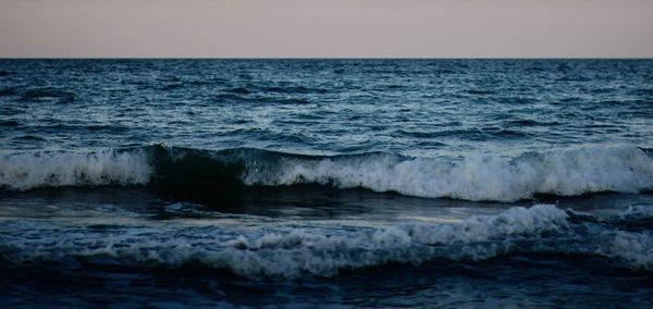 Scenic view of sea against clear sky