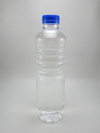 Close-up of water bottle against white background