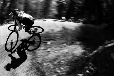 Man riding bicycle in city