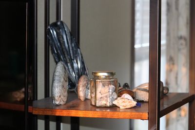 Close-up of glass jar on table