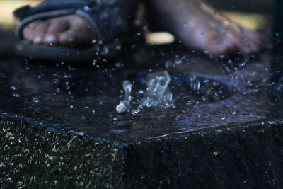 Close-up of person in lake