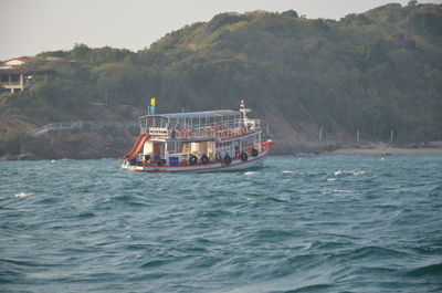 Boat sailing in sea