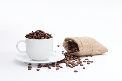 Close-up of coffee cup against white background