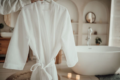 Midsection of woman in bathroom