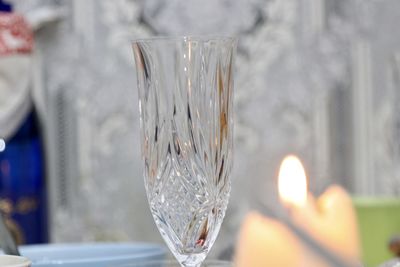 Close-up of hand holding glass