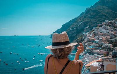 Rear view of woman looking at sea