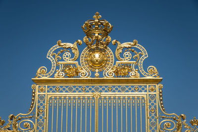 Low angle view of building against blue sky