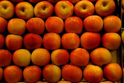 Full frame shot of stacked apples