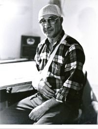 Portrait of man wearing sunglasses at home