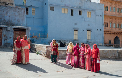 Group of people in front of building